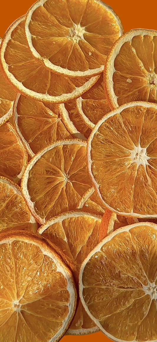 A close-up pile of dried orange slices with visible citrus pulp and textured rinds, filling the frame on a light neutral background.